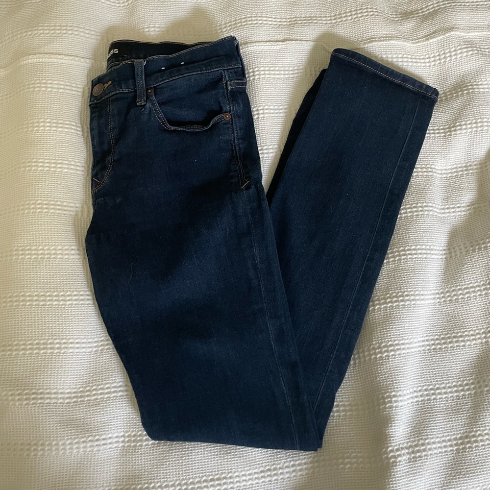 Express dark wash skinny jeans